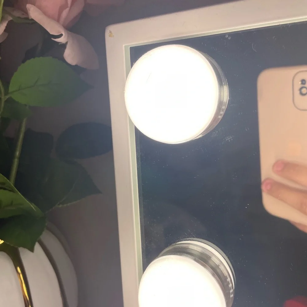 White vanity mirror